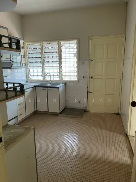 Kitchen features: white cabinetry, grey countertop, single-bowl stainless-steel sink, chrome faucet, tile backsplash, built-in cabinets, window with grid pattern, vinyl flooring, light-colored walls, door with panel design.
