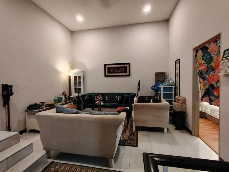 Living features: cream painted walls, wood flooring, 5-blade ceiling fan with light, 3-seater fabric sofa in dark green, 2-seater fabric sofa in beige, coffee table, area rug with geometric pattern, decorative mirror, wall-mounted artwork, floor lamp, built-in shelving unit, potted plants; style: contemporary. Room features: white painted walls, doorway leading to another room, wallpaper with floral pattern.