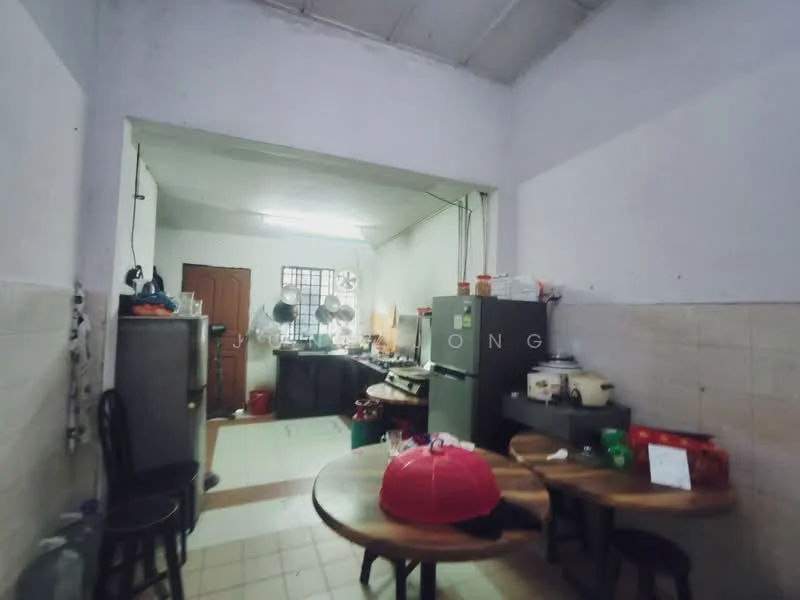 Kitchen features: white painted walls, tile flooring, exposed ceiling, double-bowl stainless-steel sink, chrome pull-down faucet, black fridge, freestanding range oven, microwave, wooden dining table, black dining chairs, kitchen cabinets, countertop with storage, window with metal grille.