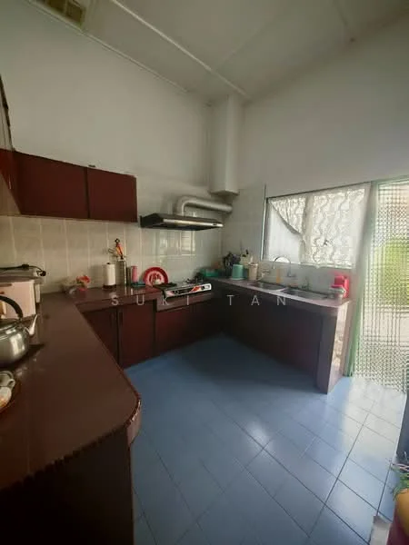 Kitchen features: brown wooden cabinetry, stainless-steel sink, chrome pull-down faucet, built-in gas stove, exhaust hood, white tiled backsplash, grey tiled flooring, window with sheer curtains, countertop with rounded edges, microwave, rice cooker, multiple cooking pots, kettle, dish rack; view: garden.
