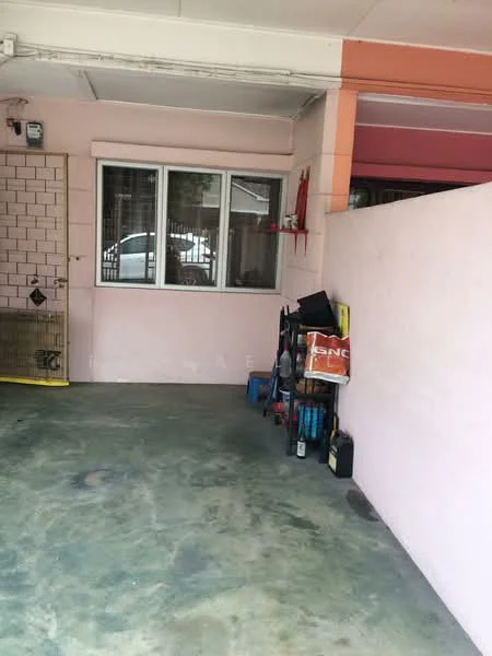 Exterior type: car porch; features: pink painted walls, concrete flooring, window with metal grille, storage items against wall, visible car outside, entrance to property; style: modern.