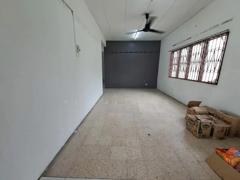 Room features: white painted walls, grey accent wall, ceiling fan, tile flooring, window with metal grilles, boxes on the floor.