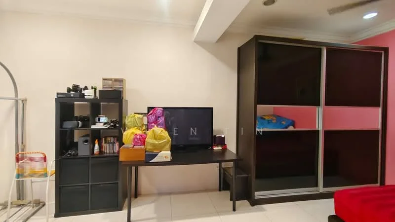 Room features: white painted walls, tile flooring, black wooden shelving unit, black TV console, flat-screen TV, decorative items on shelves, various bags on table, built-in wardrobe with sliding doors, pink accent wall, desk with items on it; style: modern.