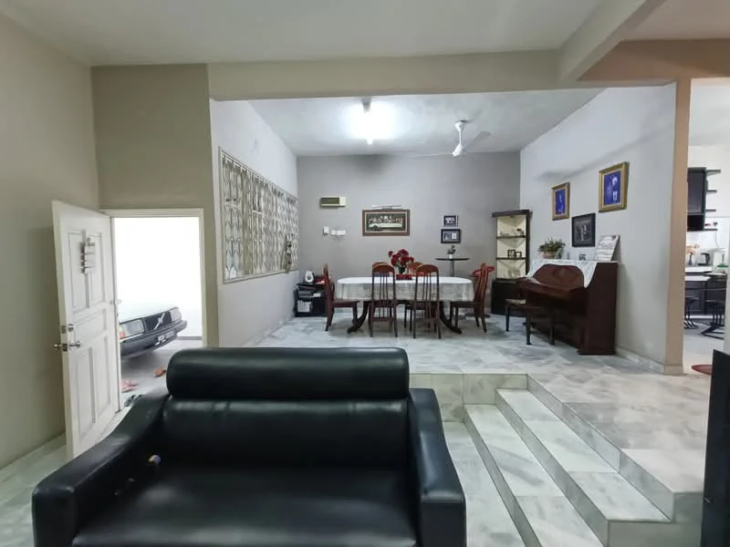 Living features: black leather sofa, marble flooring, ceiling fan, dining table with chairs, wooden sideboard, wall-mounted artwork, decorative plants, light fixtures, open layout to kitchen, window with grille, white painted walls; style: contemporary. Room features: door leading to another room, grey walls, steps leading to another area.