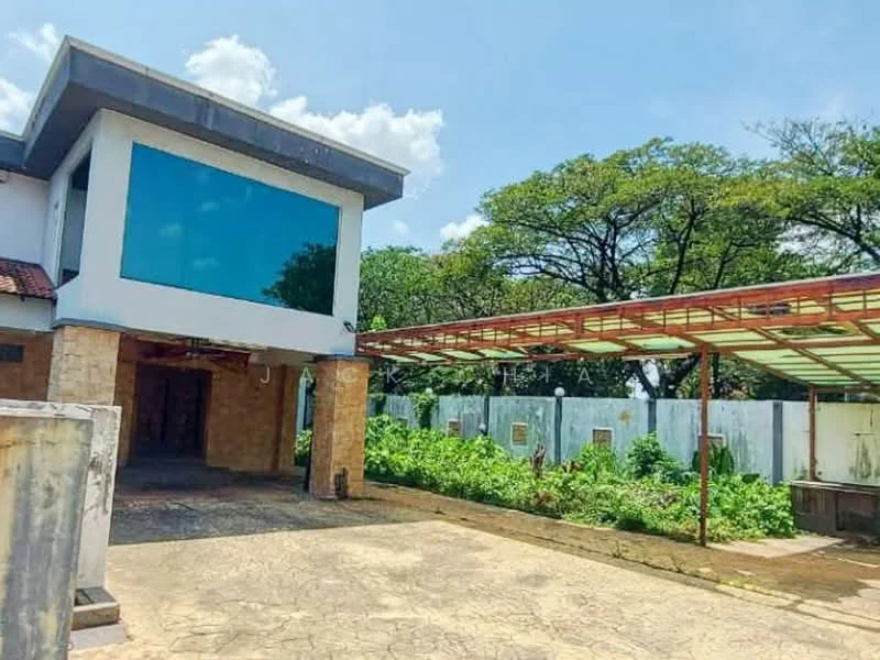 Exterior type: detached bungalow; features: large glass window, stone cladding on facade, flat roof, covered car porch, manicured lawn, surrounded by greenery, paved driveway, outdoor space with vegetation; style: modern.
