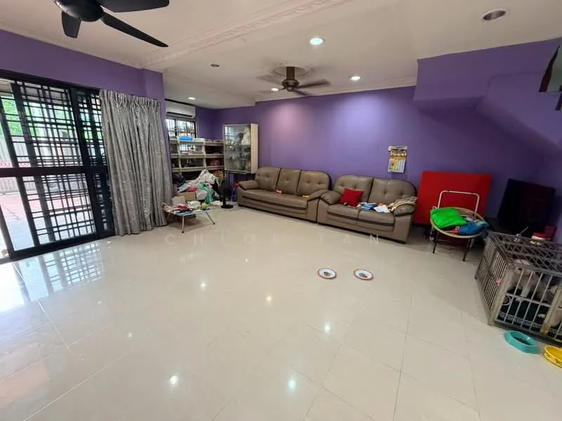 Living features: grey leather 3-seater sofa, 2-seater fabric sofa in beige, ceiling fan, white tiled flooring, purple painted walls, crown moulding, curtains, open shelving unit, decorative wall art, area rug, dog crate, toys scattered on floor; style: modern; view: garden.