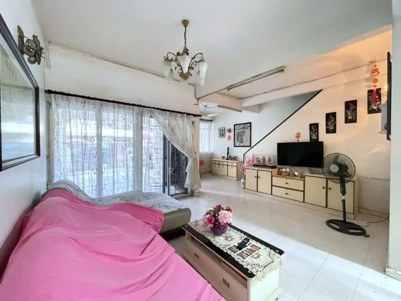 Living features: sofa with pink cover, coffee table, ceiling light fixture, floor-to-ceiling windows with sheer curtains, white tiled flooring, wall-mounted fan, decorative wall art, built-in cabinets, staircase leading to upper level.