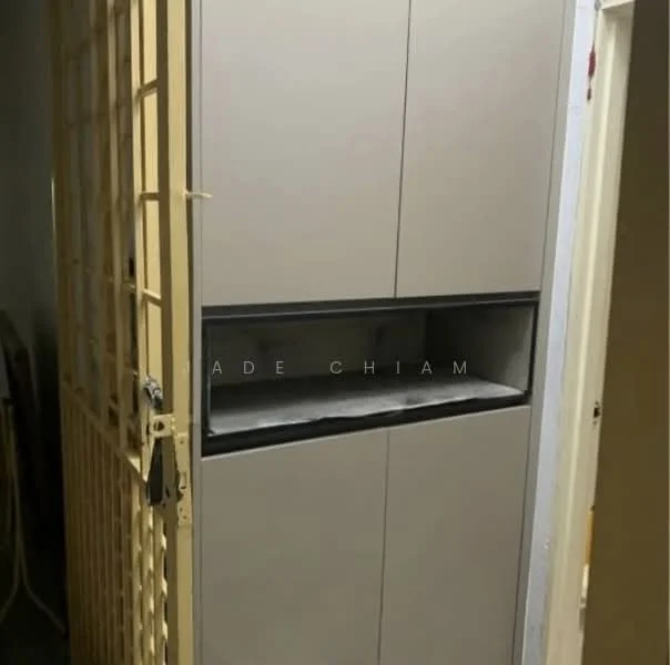 Room features: grey cabinetry, built-in storage unit, open shelf, door with grille, neutral wall colour, flooring not visible; style: modern.