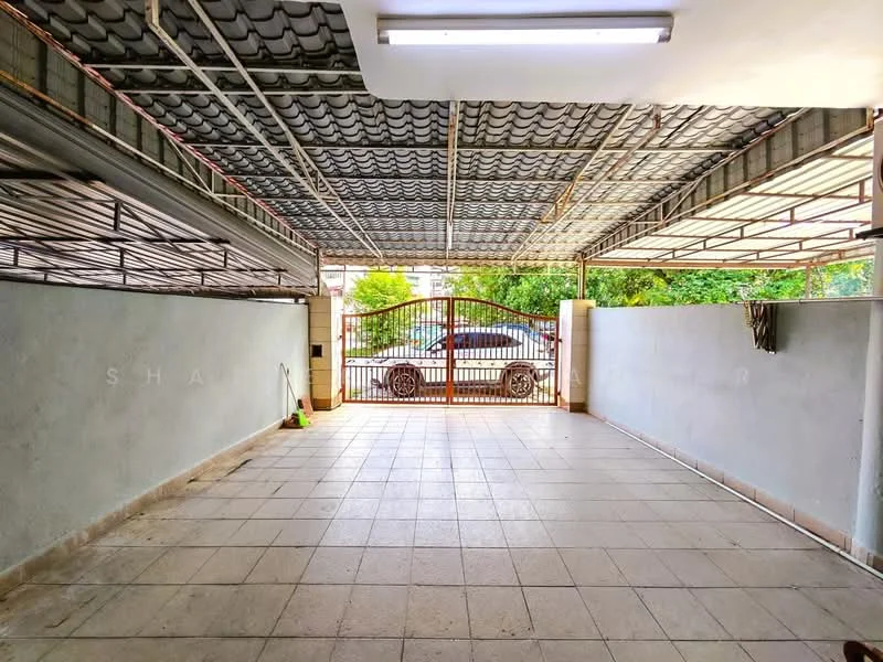 Exterior type: car porch; features: covered car porch, sliding gate, paved flooring, metal roof, exposed concrete walls, outdoor lighting, surrounded by greenery; style: modern.