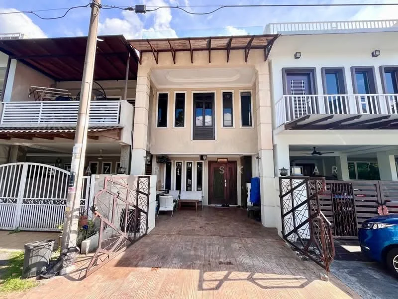 Exterior type: linked terrace house; features: two-storey building, cream painted facade, recessed balconies, wooden awning, front porch with wooden flooring, metal gate, visible outdoor seating area, landscaped front yard, parking space, surrounded by greenery; style: modern.