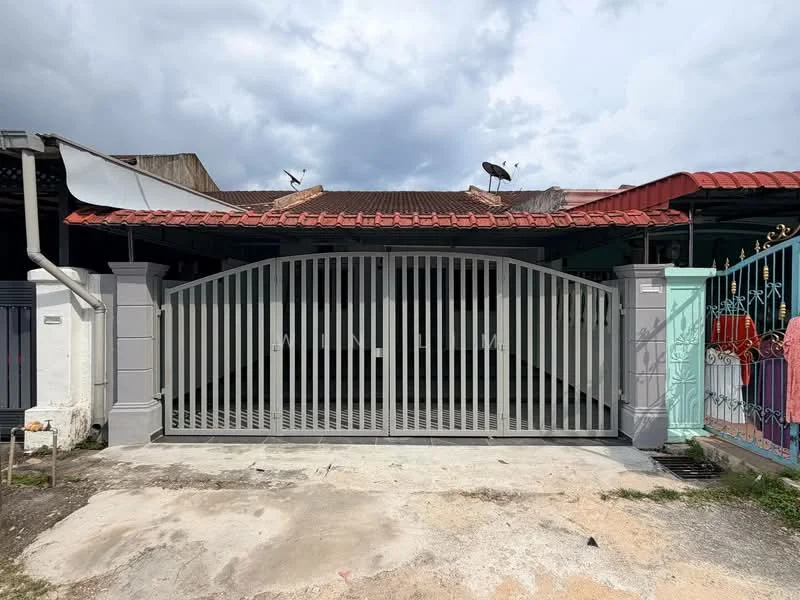 Exterior type: linked terrace house; features: grey metal gate, red tiled roof, concrete facade, paved driveway, surrounded by low walls, satellite dishes on roof, open space in front; style: modern.