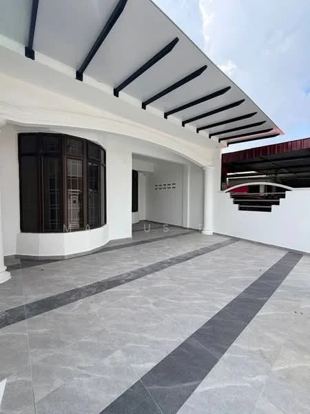 Exterior type: detached bungalow; features: white painted facade, flat roof with overhang, large curved windows, grey tiled flooring, decorative ceiling beams, open parking area, manicured landscaping, surrounding walls, covered porch area; style: modern.