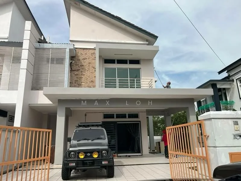 Exterior type: detached bungalow; features: two-storey building, white painted facade, exposed brick accents, balcony on the second floor, large windows, covered porch, paved driveway, orange metal gate, manicured landscaping, security gate, car parked in driveway; style: modern.