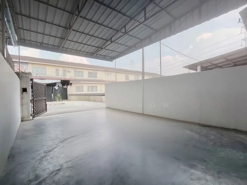 Exterior features: covered car porch, concrete flooring, white painted walls, metal roof, open space, surrounded by low-rise buildings; style: modern.