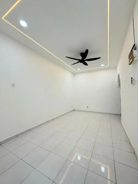 Room features: white painted walls, recessed ceiling lights, 5-blade ceiling fan in black, glossy white floor tiles, no visible furniture, neutral color scheme, corner wall with electrical outlet, open space layout; style: modern.