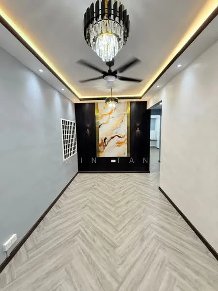 Room features: chevron-patterned laminate flooring, grey painted walls, feature wall with black vertical slats, large abstract artwork, recessed LED downlights, chandelier with crystal accents, 5-blade ceiling fan, crown moulding, white wall paneling, decorative wall grid, neutral color palette; style: modern.