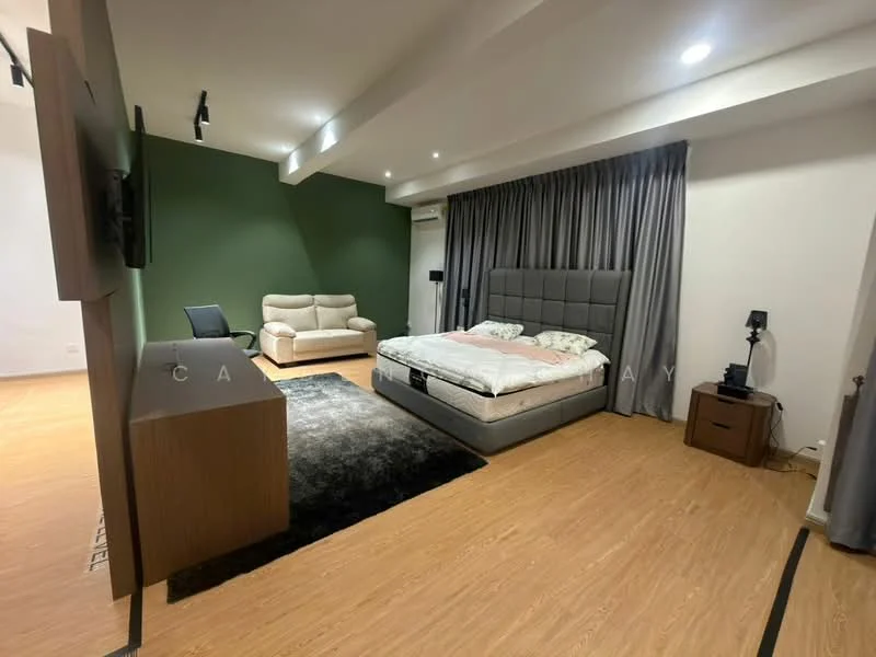 Bedroom features: king-size bed with upholstered headboard, grey bedding, 2 bedside lamps, wooden flooring, green accent wall, floor-to-ceiling curtains, sofa in cream color, black area rug, wall-mounted TV, air conditioning unit, wooden dresser; style: modern.