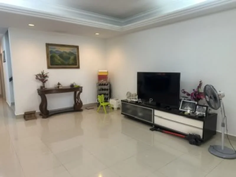 Living features: white painted walls, glossy tile flooring, recessed ceiling lights, wall-mounted TV, TV console in black and white, decorative console table, framed artwork on wall, floor fan, green accent chair, decorative plants, shelves with bottles; style: modern.