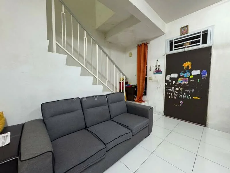 Living features: grey fabric 3-seater sofa, white painted walls, white tiled flooring, staircase with white railing, decorative wall with children's drawings, wooden door, window with security grille, orange curtain; style: modern.