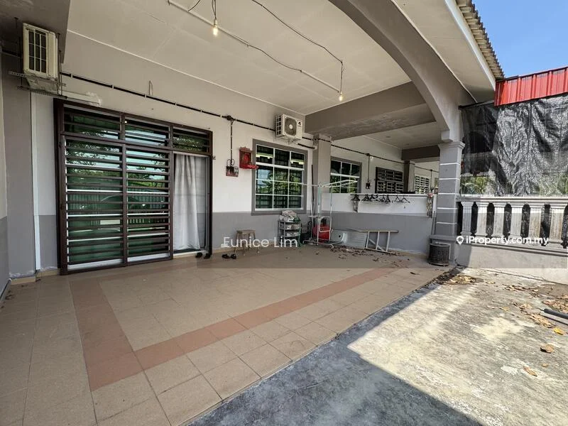 Exterior type: detached bungalow; features: covered porch area, sliding glass door, multiple windows, wall-mounted split AC unit, tiled flooring, exposed concrete wall, decorative railing, landscaped garden area, awning over porch, outdoor seating area; style: modern.