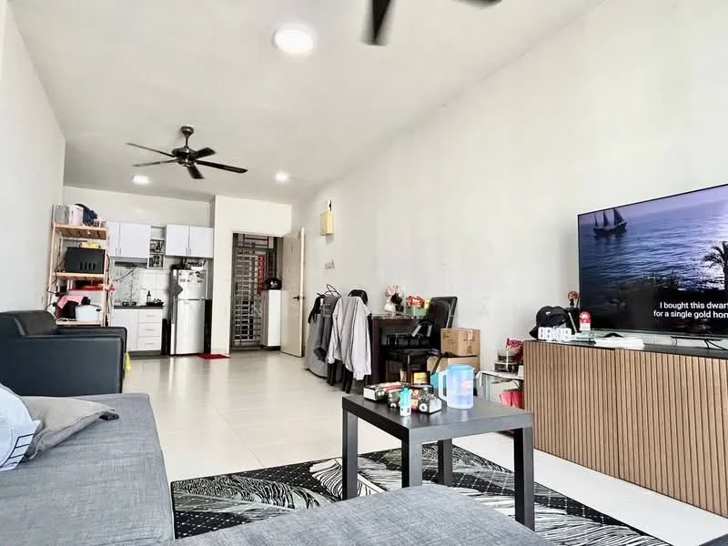 Living features: grey fabric sofa, black coffee table, area rug with palm leaf pattern, wall-mounted TV, TV console with wood finish, 5-blade ceiling fan, white painted walls, tile flooring, open layout to kitchen, decorative items on coffee table; style: modern. Kitchen features: white cabinetry, stainless-steel sink, built-in oven, freestanding range oven, microwave, tile backsplash, open shelving, refrigerator, countertop space; style: modern.