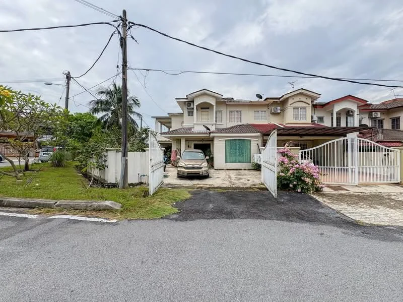 Exterior type: linked terrace house; features: two-storey building, white painted facade, red tiled roof, front porch with car parking space, fenced yard with gate, manicured lawn, flowering shrubs, visible air conditioning units, paved driveway, surrounded by residential area; style: modern.