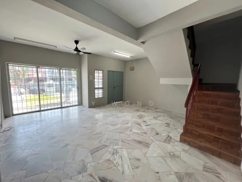 Living features: marble flooring, grey painted walls, 5-blade ceiling fan, large windows with metal grilles, staircase with wooden steps, door leading to another room, natural light from windows, open layout; style: modern; view: garden.