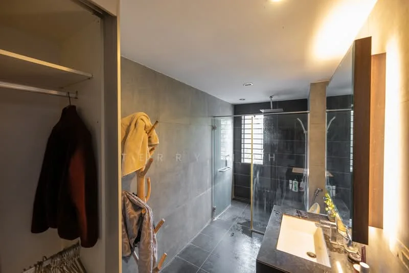 Bathroom features: grey tiled walls, black tiled flooring, walk-in shower with glass enclosure, rain shower head, single-sink vanity with dark wood cabinet, mirror above vanity, wall-mounted towel rack, open shelving, window for natural light, recessed lighting; style: modern.