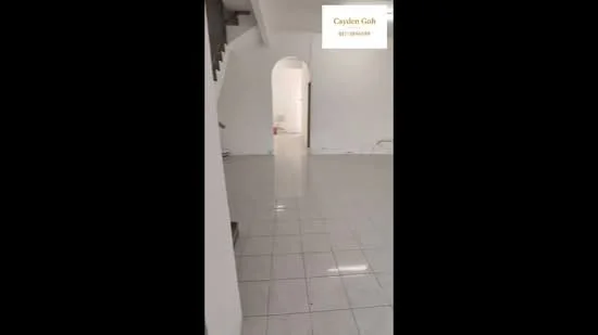 Room features: white painted walls, glossy white tile flooring, arched doorway, staircase visible in background, neutral color scheme, no visible furniture, open space layout, bright lighting; style: modern.