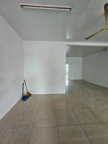 Room features: white painted walls, glossy ceramic tile flooring, ceiling fan, natural light from windows, open layout, clean and minimal decor, broom in corner; style: minimalist.