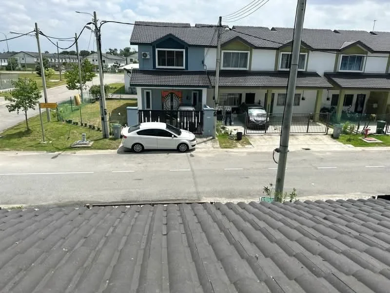 Exterior type: linked terrace house; features: two-storey linked terrace, grey tiled roof, white painted facade, black wrought iron gate, manicured lawn, paved driveway, street view, power lines visible, sidewalk, adjacent to residential area; style: modern.