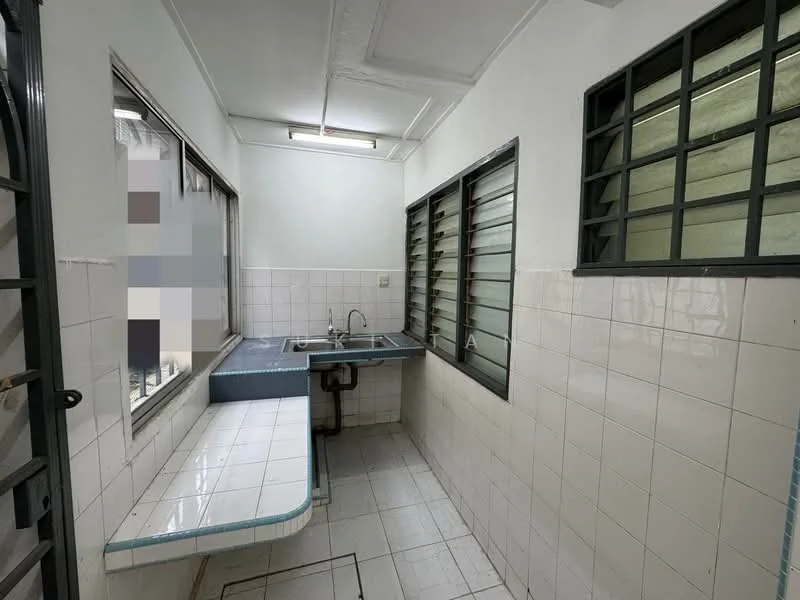 Kitchen features: white tiled walls, white tiled flooring, single-bowl stainless-steel sink, chrome faucet, countertop with blue edge, window with metal grilles, sliding window, built-in table, natural light from windows.