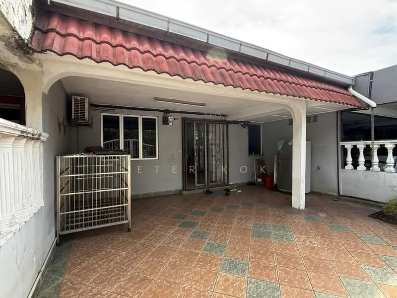 Exterior type: linked terrace house; features: red pitched tile roof, white painted facade, manicured lawn, stone-paved walkway, security grille door, air conditioning unit, outdoor space with tiled flooring, fenced area, visible drainage system; style: modern.