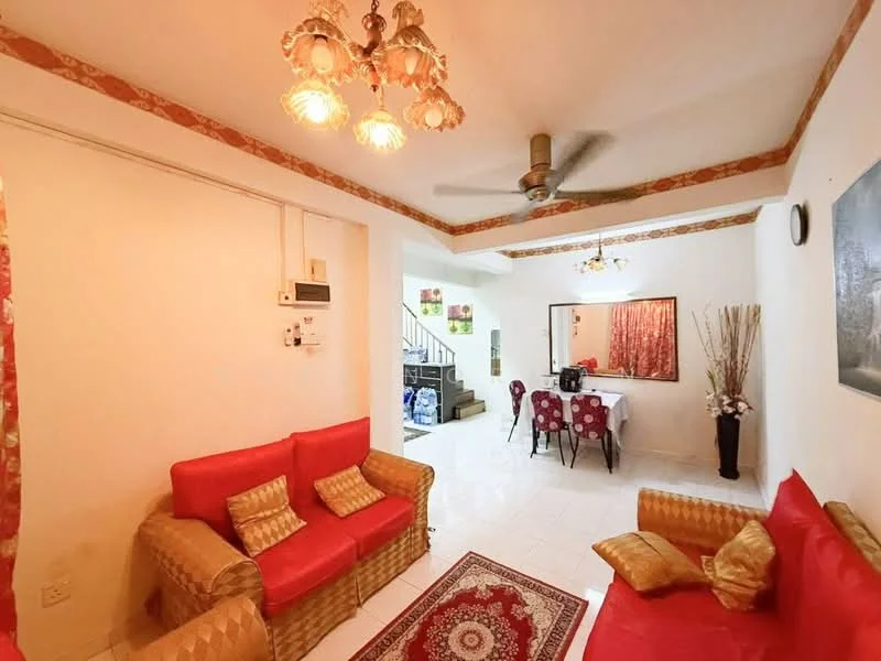 Living features: red fabric sofa with cushions, woven rattan armchairs, area rug with intricate pattern, ceiling fan, chandelier with multiple lights, white painted walls, tile flooring, wall-mounted air conditioning unit, decorative mirror, wall clock, dining table with red patterned chairs, decorative plants in vases; style: modern.