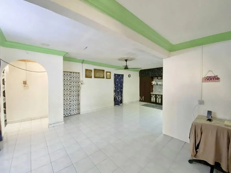 Living features: white tiled flooring, plain white walls, green painted ceiling, ceiling fan, arched doorway, decorative wall panels, wall-mounted light fixture, open layout, neutral decor, window with curtain, corner table, electrical outlet; style: minimalist.