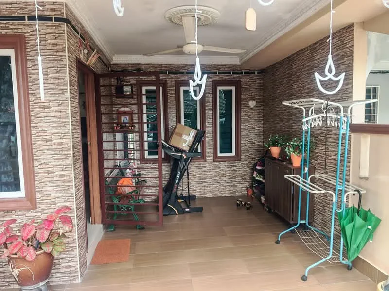 Room features: wooden flooring, exposed brick accent wall, ceiling fan, sliding glass door, decorative wall plants, exercise equipment, metal coat rack, storage cabinet, green potted plants, welcome mat; style: modern; view: garden.