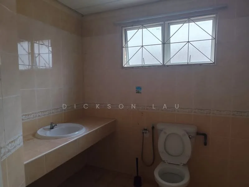 Bathroom features: cream tiled walls, cream tiled flooring, round sink, single-basin sink, wall-mounted faucet, toilet, window with grid pattern, countertop with built-in shelf.