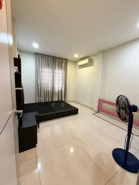 Room features: white painted walls, tile flooring, recessed downlights, floor-to-ceiling windows with sheer curtains, 1 wall-mounted split AC, black sofa bed, black TV console, standing fan, pink playpen; style: modern.