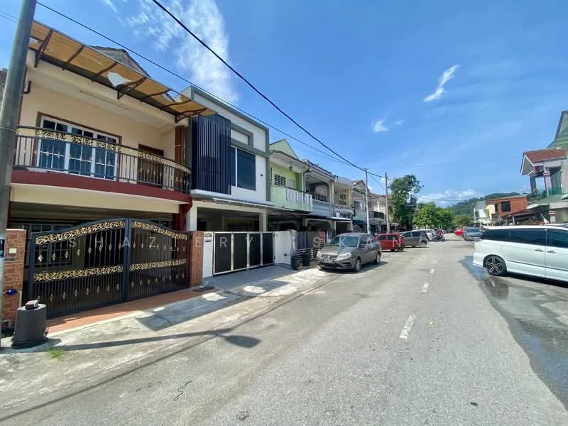 Exterior type: linked terrace house; features: two-storey linked terrace houses, black wrought iron gates, white painted facade, balconies with awnings, driveways with interlocking pavers, manicured front gardens, street view with parked cars, clear blue sky, surrounded by residential area; style: modern.