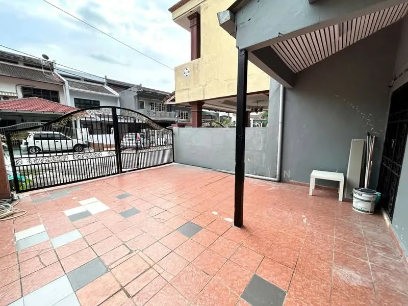 Exterior type: linked terrace house; features: paved outdoor area, metal gate, grey painted walls, red tile flooring, surrounded by residential buildings, covered porch area, fence, outdoor seating area; style: modern.
