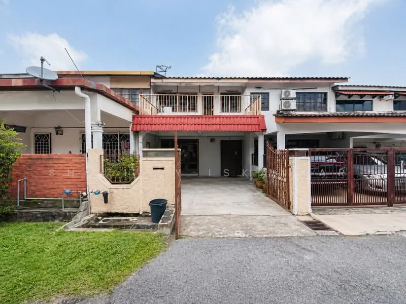 Exterior type: linked terrace house; features: red tiled roof, two-storey structure, brick facade, front garden with grass, paved driveway, car porch with awning, balcony on the upper floor, visible air conditioning units, fenced front yard, gate at entrance; style: modern.