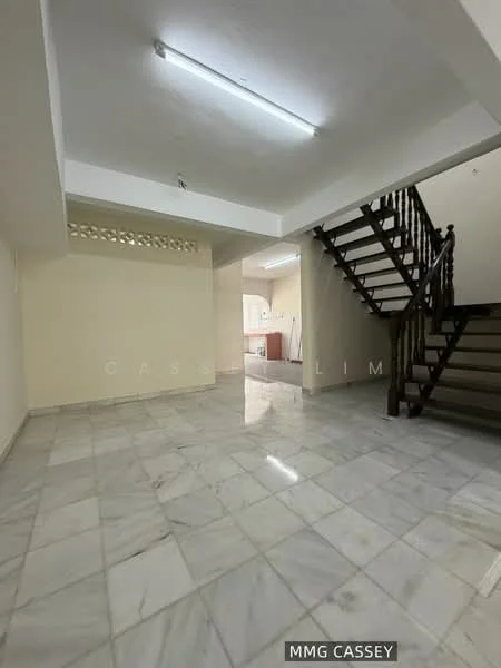 Room features: marble flooring, white painted walls, exposed ceiling with fluorescent lighting, wooden staircase, open layout, no visible furniture, large wall space, natural light from windows; style: modern.