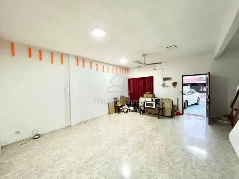 Room features: white painted walls, marble tile flooring, ceiling fan, red curtains, door leading outside, various boxes and items, open space layout.