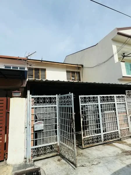 Exterior type: linked terrace house; features: metal gate, concrete driveway, gravel pathway, two-storey structure, sloped roof, wooden window shutters, exposed brick wall, white painted facade, front porch area, surrounded by residential buildings; style: traditional.