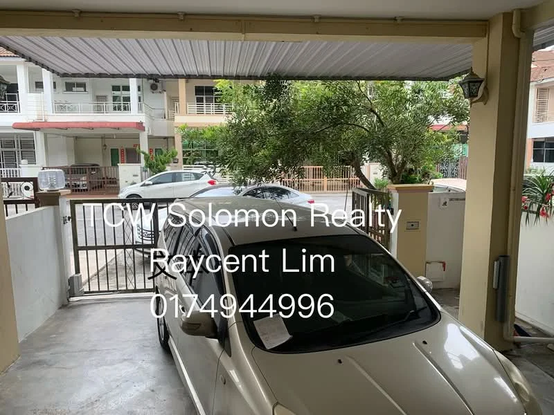 Exterior type: linked terrace house; features: car porch with awning, gate at entrance, paved driveway, surrounded by greenery, two parked cars visible, fenced perimeter; style: modern.