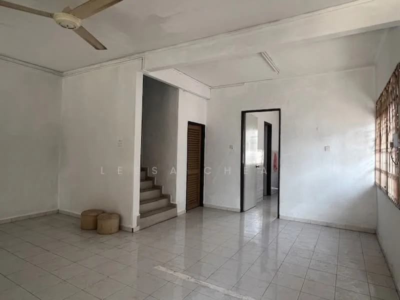 Room features: white painted walls, tile flooring, ceiling fan, staircase, window with wooden grille, doorway leading to another room, two storage ottomans.