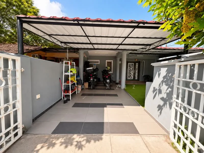 Exterior type: detached bungalow; features: covered car porch with metal roofing, grey painted facade, paved driveway with large tiles, manicured lawn, white metal gate, decorative wall with vertical slats, outdoor lighting fixtures; style: modern.