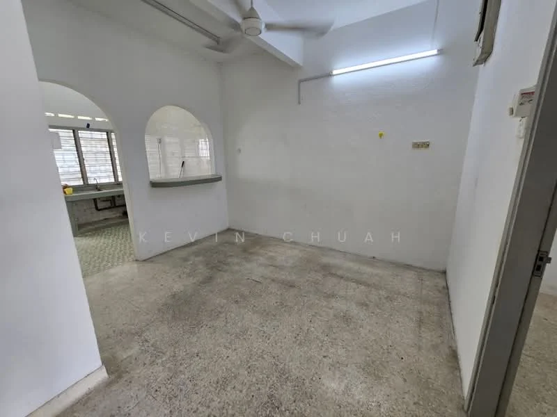 Room features: white painted walls, concrete flooring, ceiling fan, arched openings, window with grille, light fixture on wall, no visible furniture, neutral color scheme; style: minimalist.