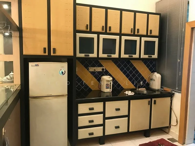 Kitchen features: black countertop, cream cabinetry with textured finish, blue tiled backsplash with diamond pattern, stainless-steel sink, single-bowl sink, white fridge, kettle, toaster, built-in cabinets, wall-mounted cabinets with glass doors, under-cabinet lighting; style: modern.