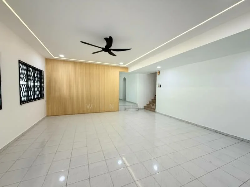Living features: white painted walls, wood panel accent wall, glossy tile flooring, 5-blade ceiling fan, recessed LED downlights, large windows with security grills, open layout, staircase visible in background; style: modern.